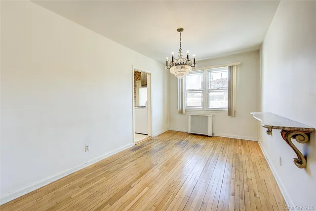 a view of livingroom with hardwood floor and window