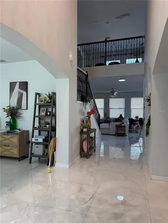 a room with furniture and gym equipment