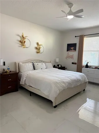 a view of living room with furniture and flat screen tv