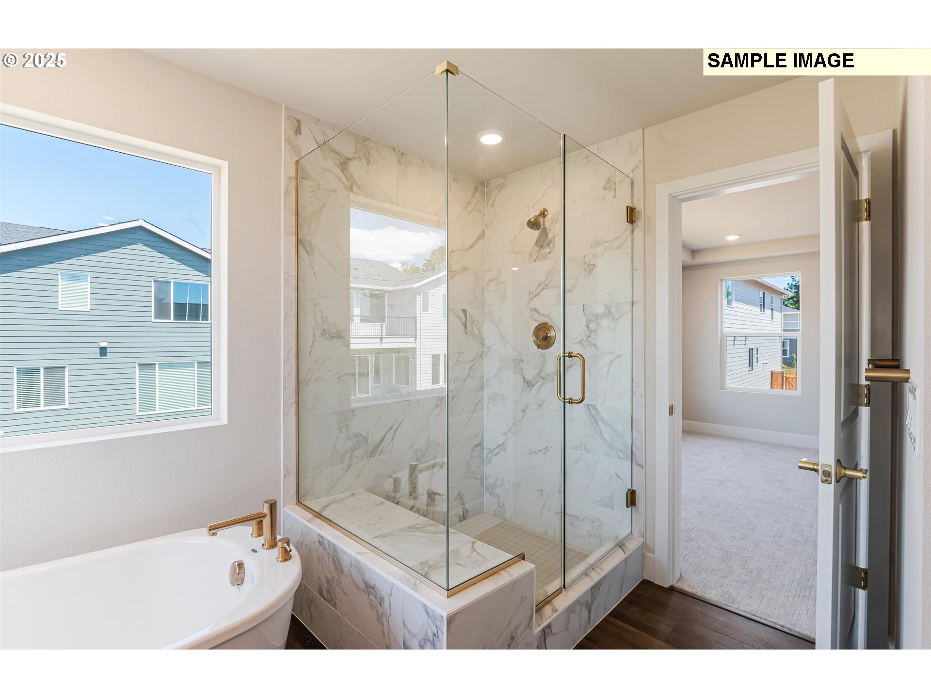 6749 Southwest Windflower Street Wilsonville, OR 97070 - Photo 13 of 33 a bathroom with a shower sink and mirror