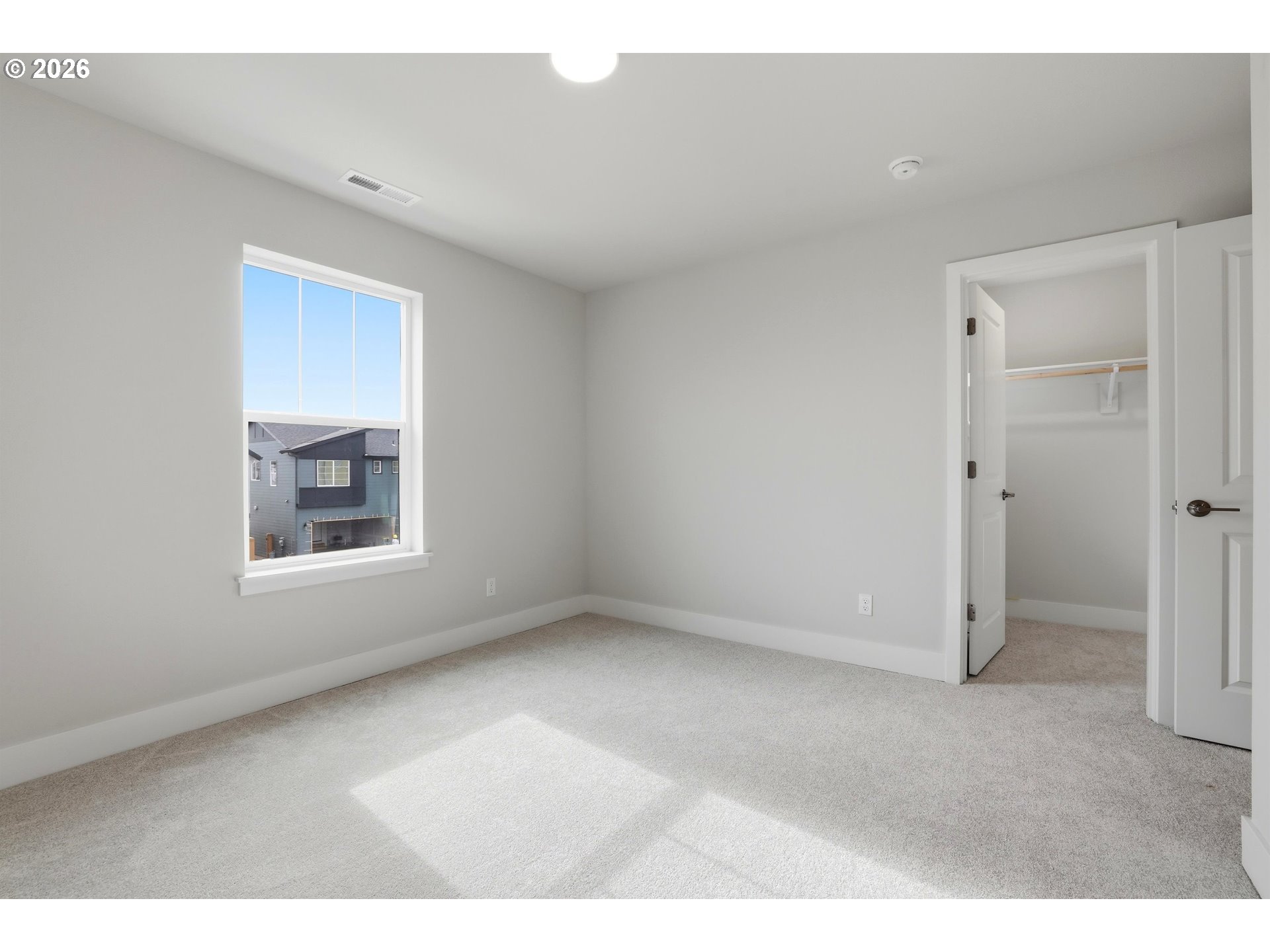 6749 Southwest Windflower Street Wilsonville, OR 97070 - Photo 28 of 33 a view of an empty room with a window