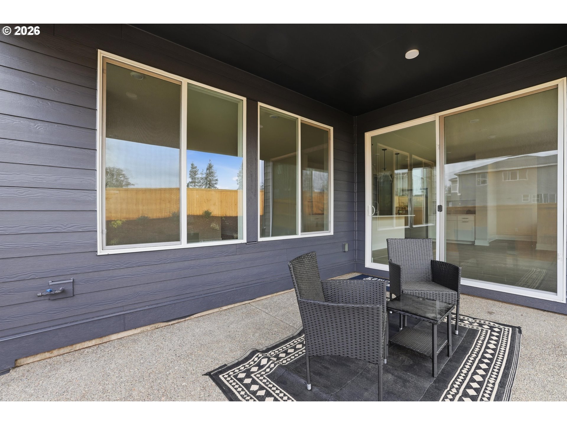 6749 Southwest Windflower Street Wilsonville, OR 97070 - Photo 31 of 33 a balcony with furniture and window