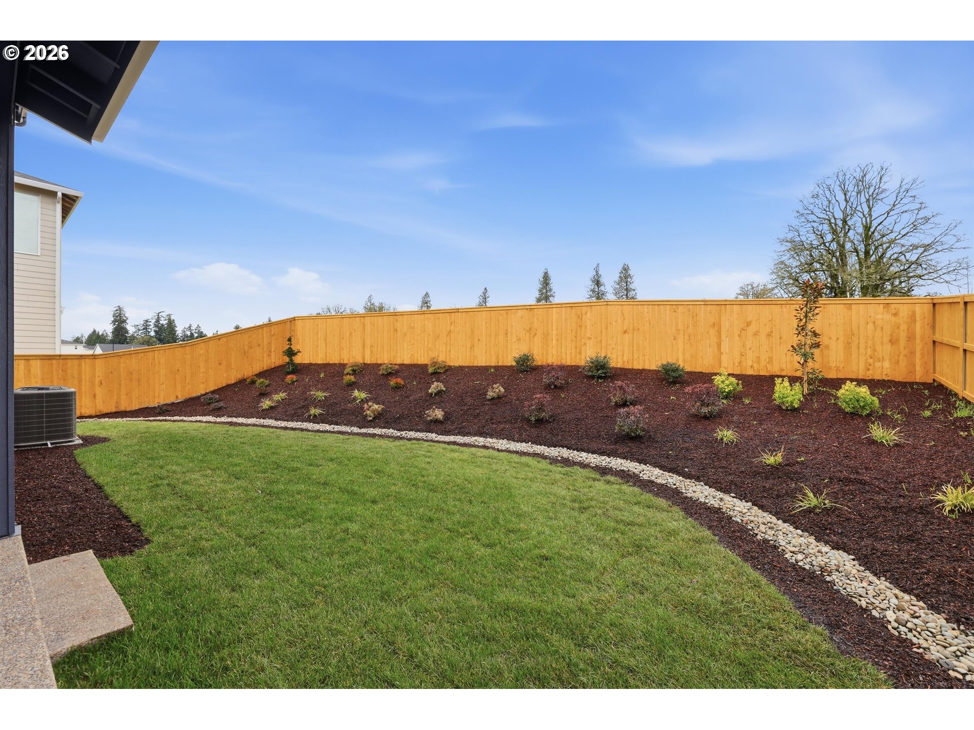 6749 Southwest Windflower Street Wilsonville, OR 97070 - Photo 32 of 33 a view of an outdoor space and swimming pool