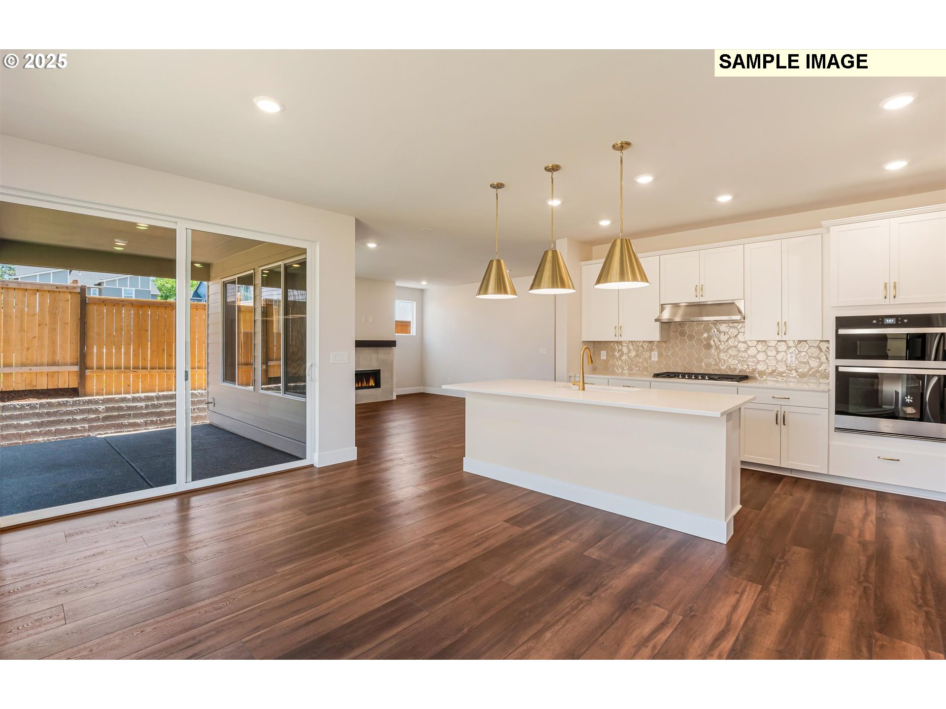 6749 Southwest Windflower Street Wilsonville, OR 97070 - Photo 6 of 33 a view of kitchen with wooden floor