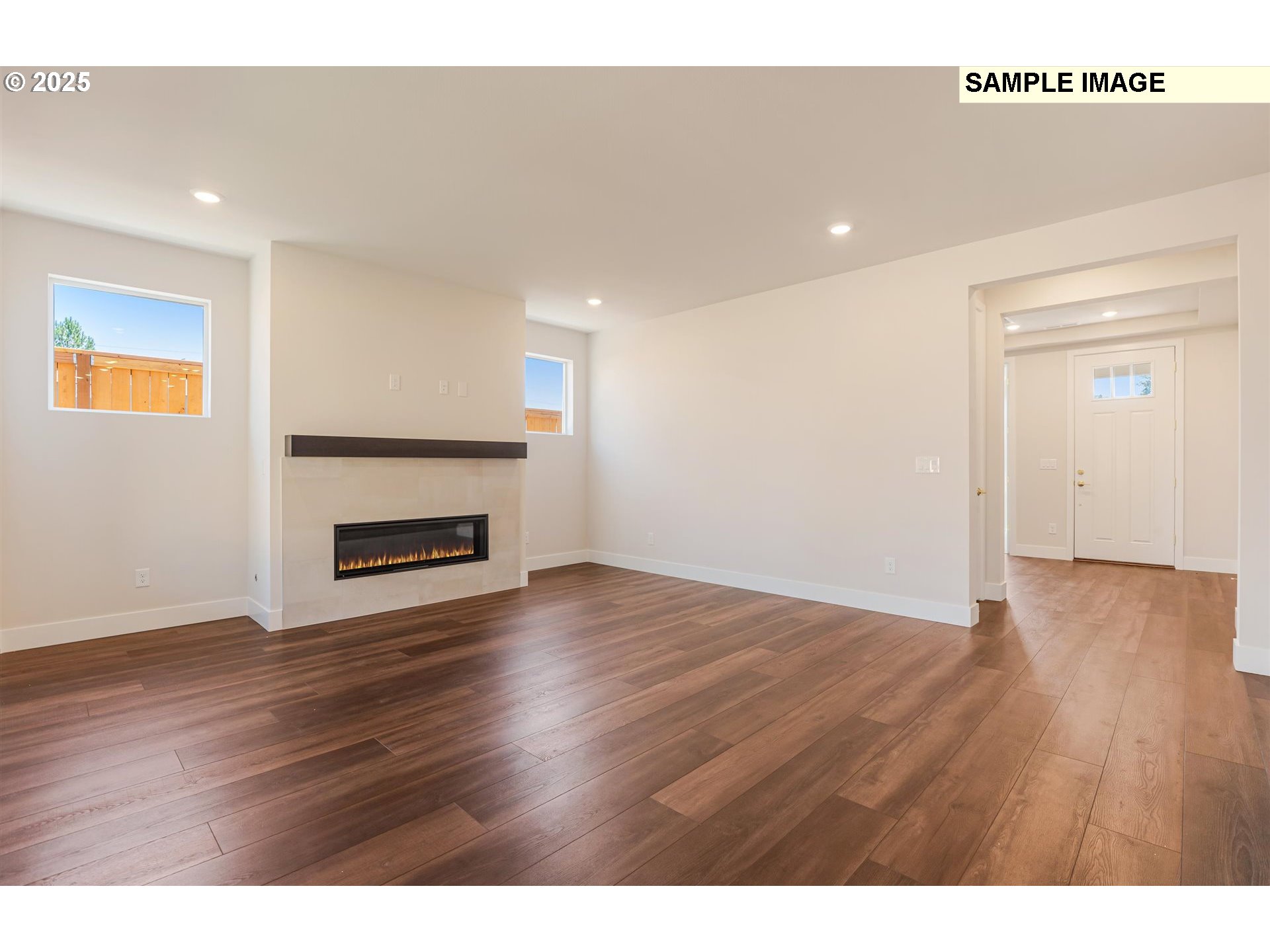 6749 Southwest Windflower Street Wilsonville, OR 97070 - Photo 8 of 33 a view of a livingroom with wooden floor