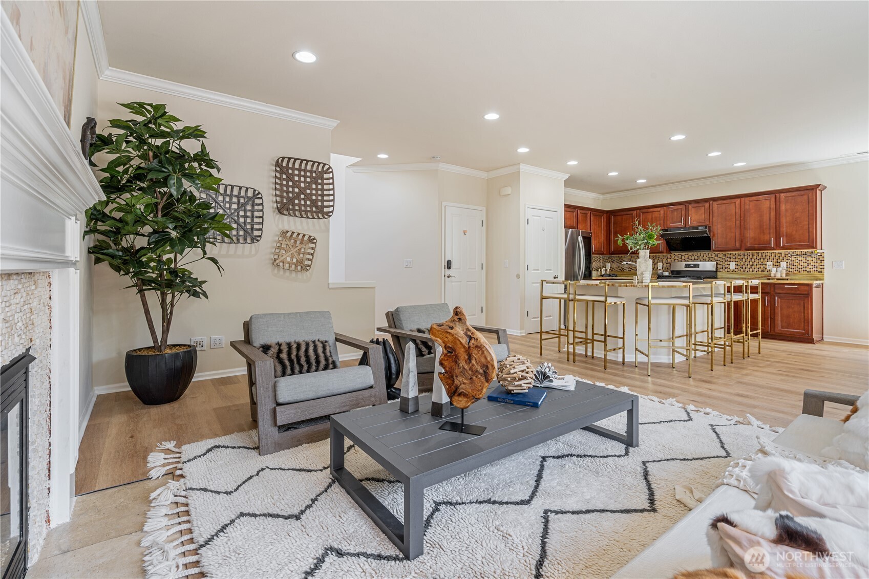 9528 25th Drive Southeast Everett, WA 98208 - Photo 11 of 36 a living room with furniture a potted plant and kitchen view