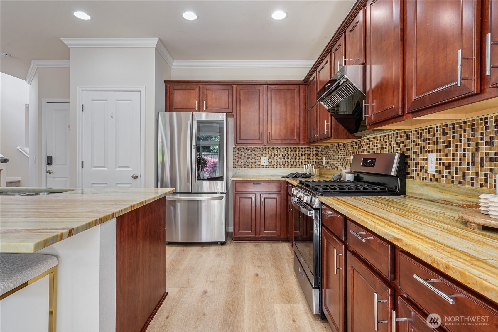 9528 25th Drive Southeast Everett, WA 98208 - Photo 15 of 36 a kitchen with stainless steel appliances granite countertop a sink stove and refrigerator