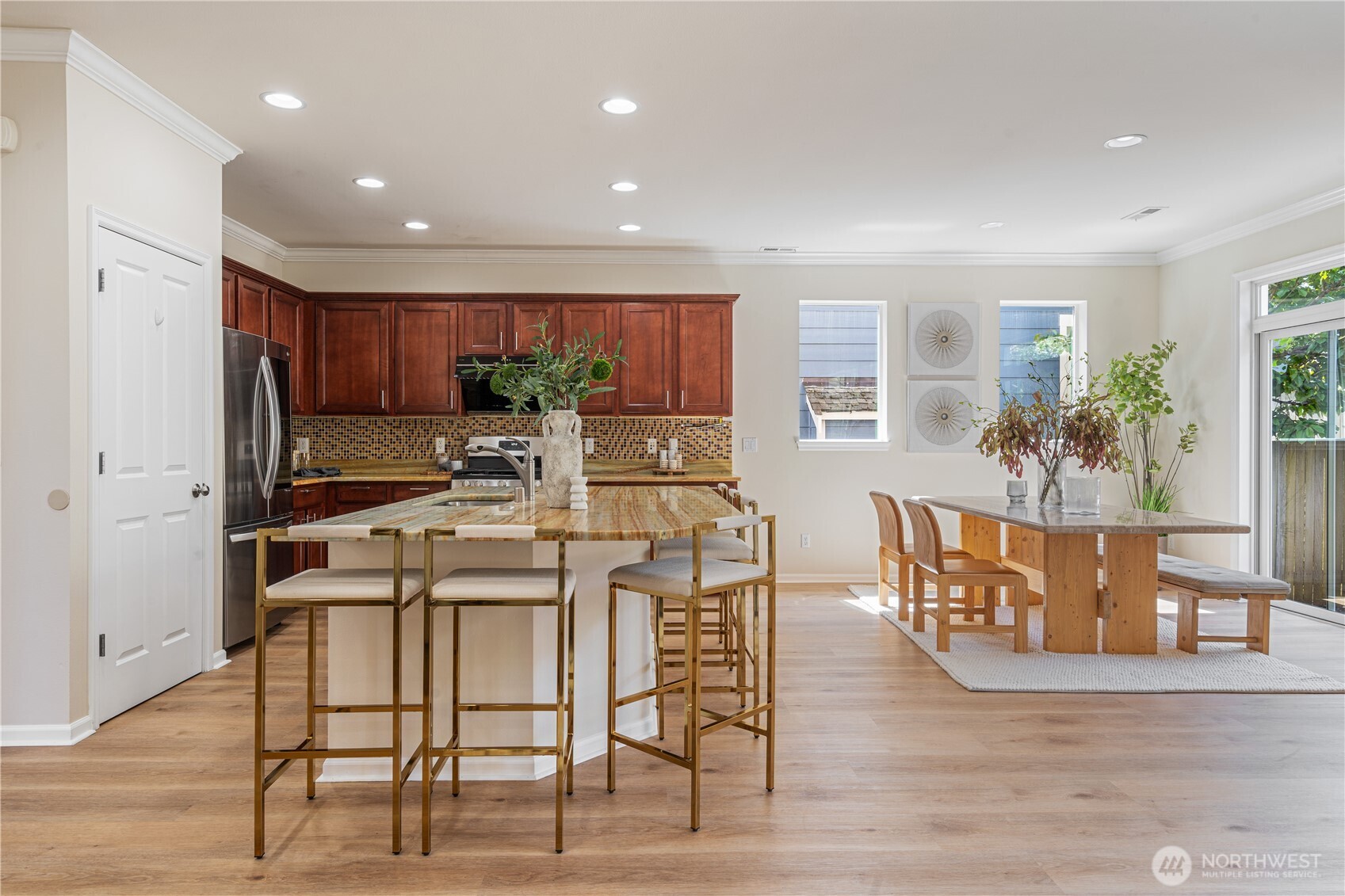 9528 25th Drive Southeast Everett, WA 98208 - Photo 18 of 36 a view of a dining room with furniture window and wooden floor