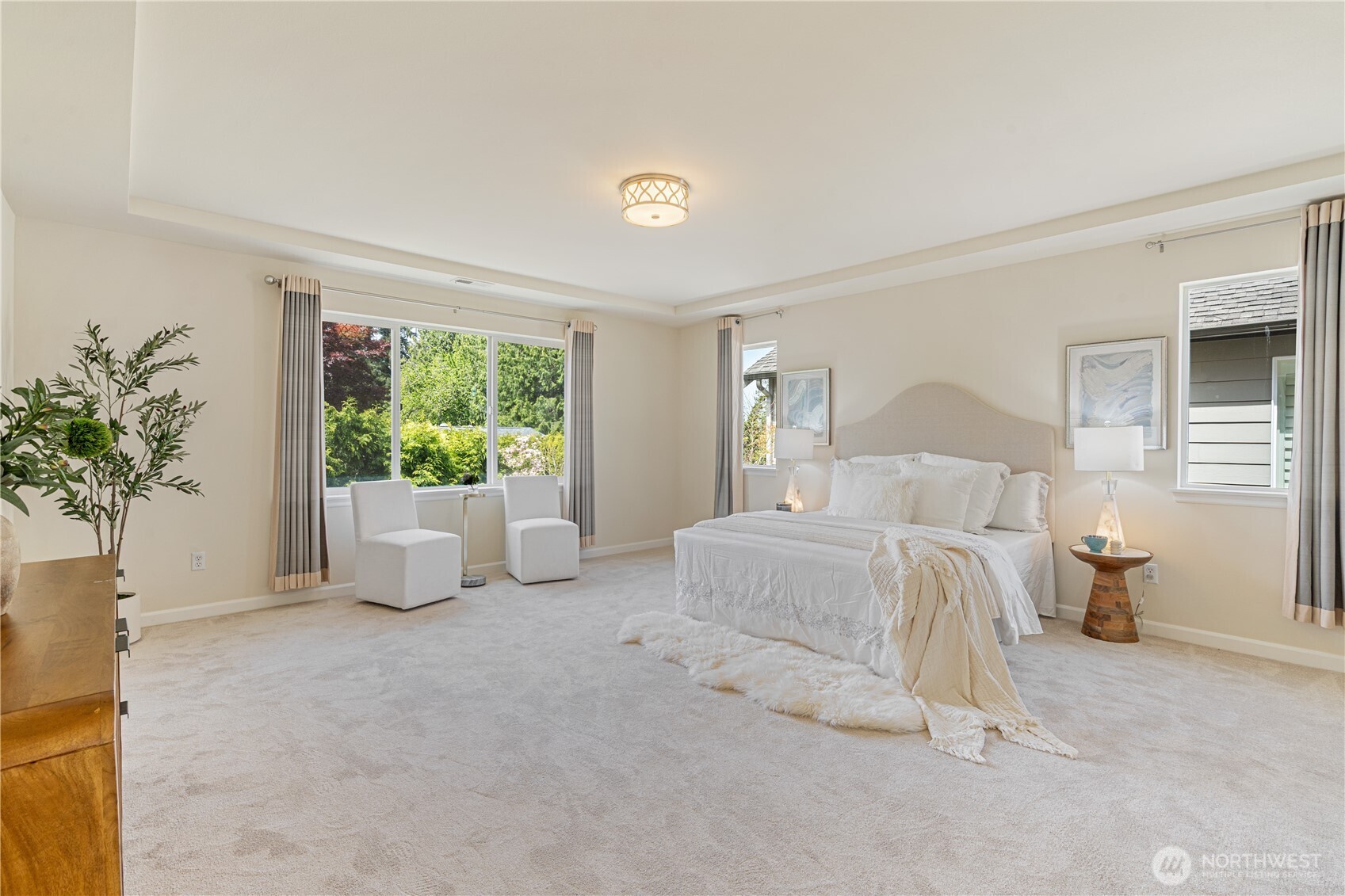 9528 25th Drive Southeast Everett, WA 98208 - Photo 21 of 36 a spacious bedroom with a bed and a window