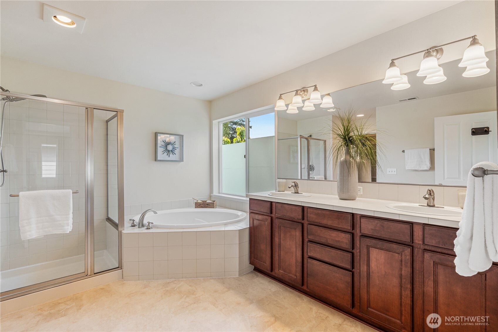 9528 25th Drive Southeast Everett, WA 98208 - Photo 24 of 36 a bathroom with a tub sink and mirror