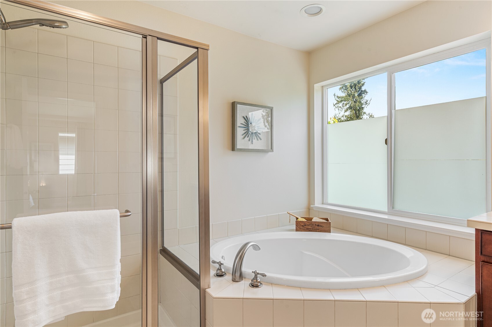 9528 25th Drive Southeast Everett, WA 98208 - Photo 25 of 36 a white bath tub sitting next to a bathroom