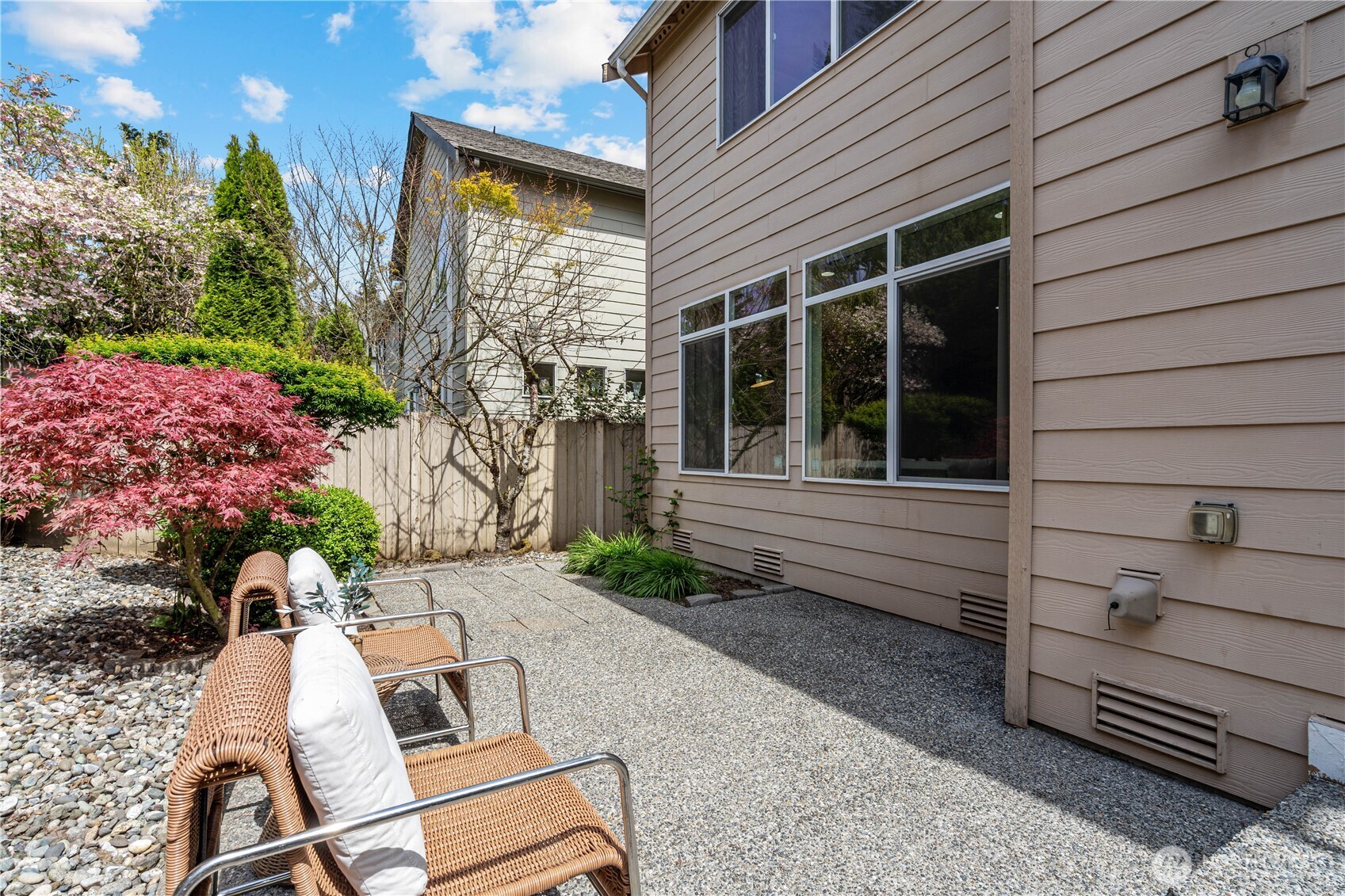 9528 25th Drive Southeast Everett, WA 98208 - Photo 35 of 36 a view of a chair and table in backyard of the house