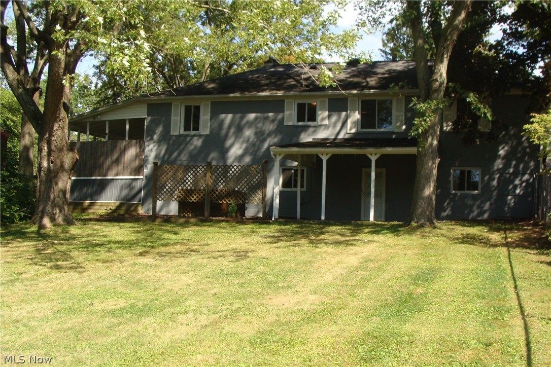 2230 Graham Road Stow, OH 44224 - Photo 29 of 34 Back yard is partially fenced in for pets or kids or just privacy. and a covered patio