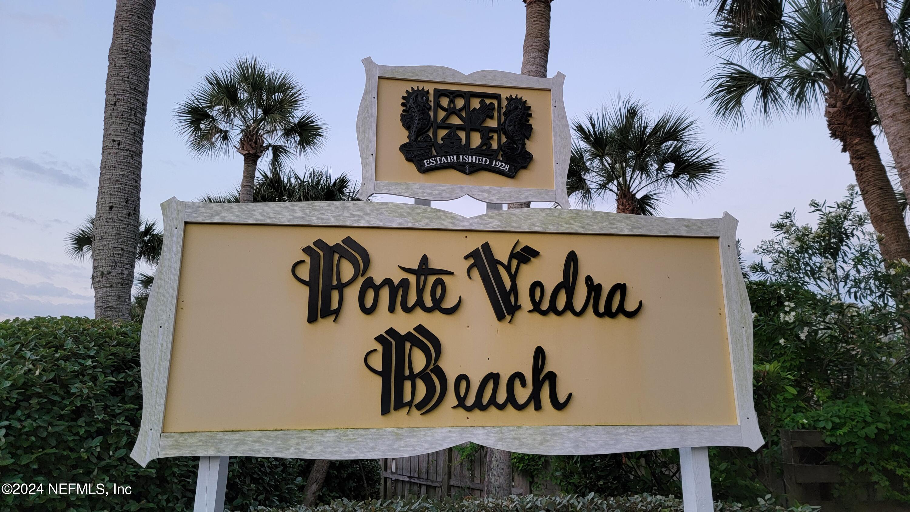 324 Pablo Road Ponte Vedra Beach, FL 32082 - Photo 4 of 11 a sign that is on the wall of a building