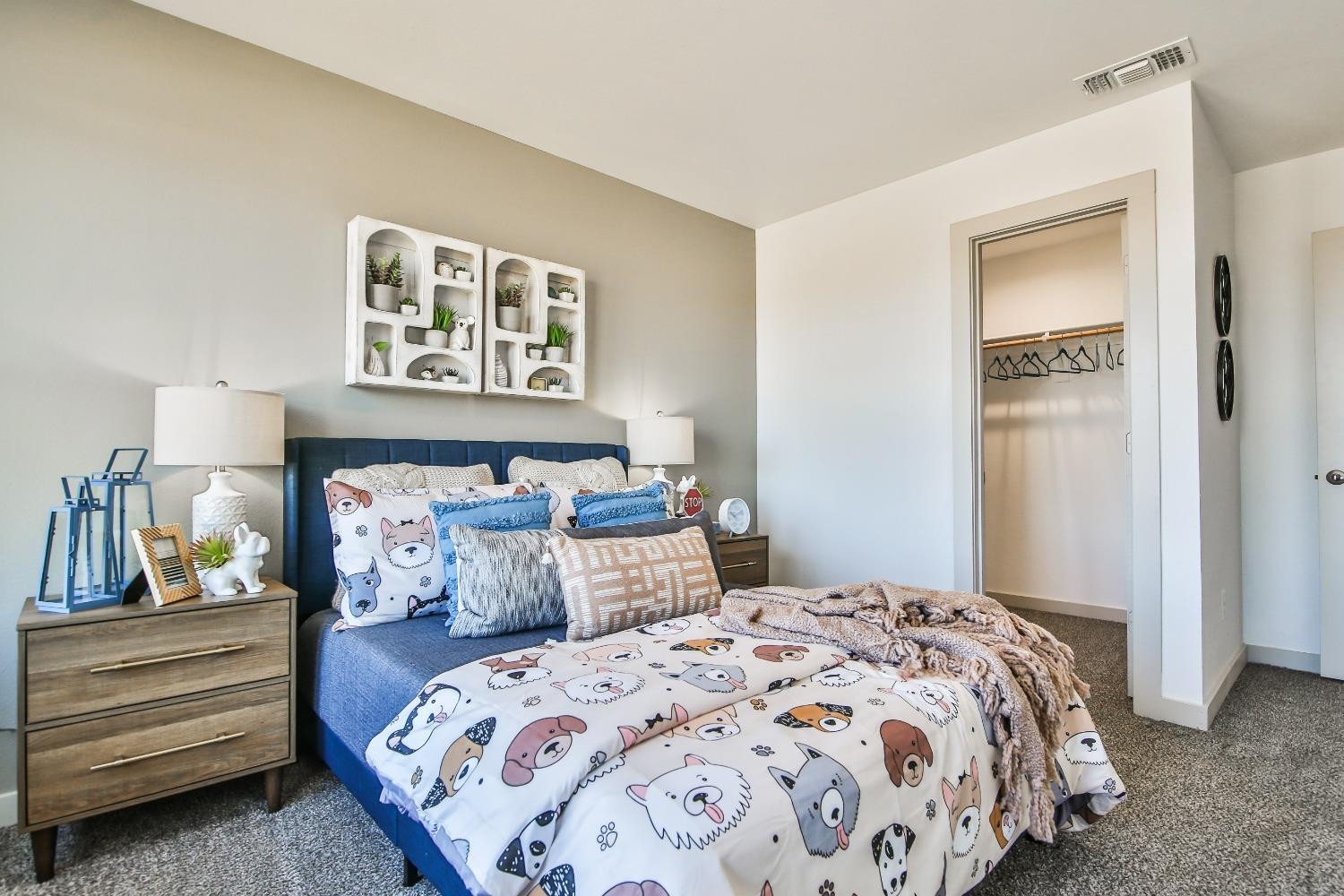 6802 55th Street Lubbock, TX 79407 - Photo 14 of 36 a bedroom with a bed and a painting on the wall