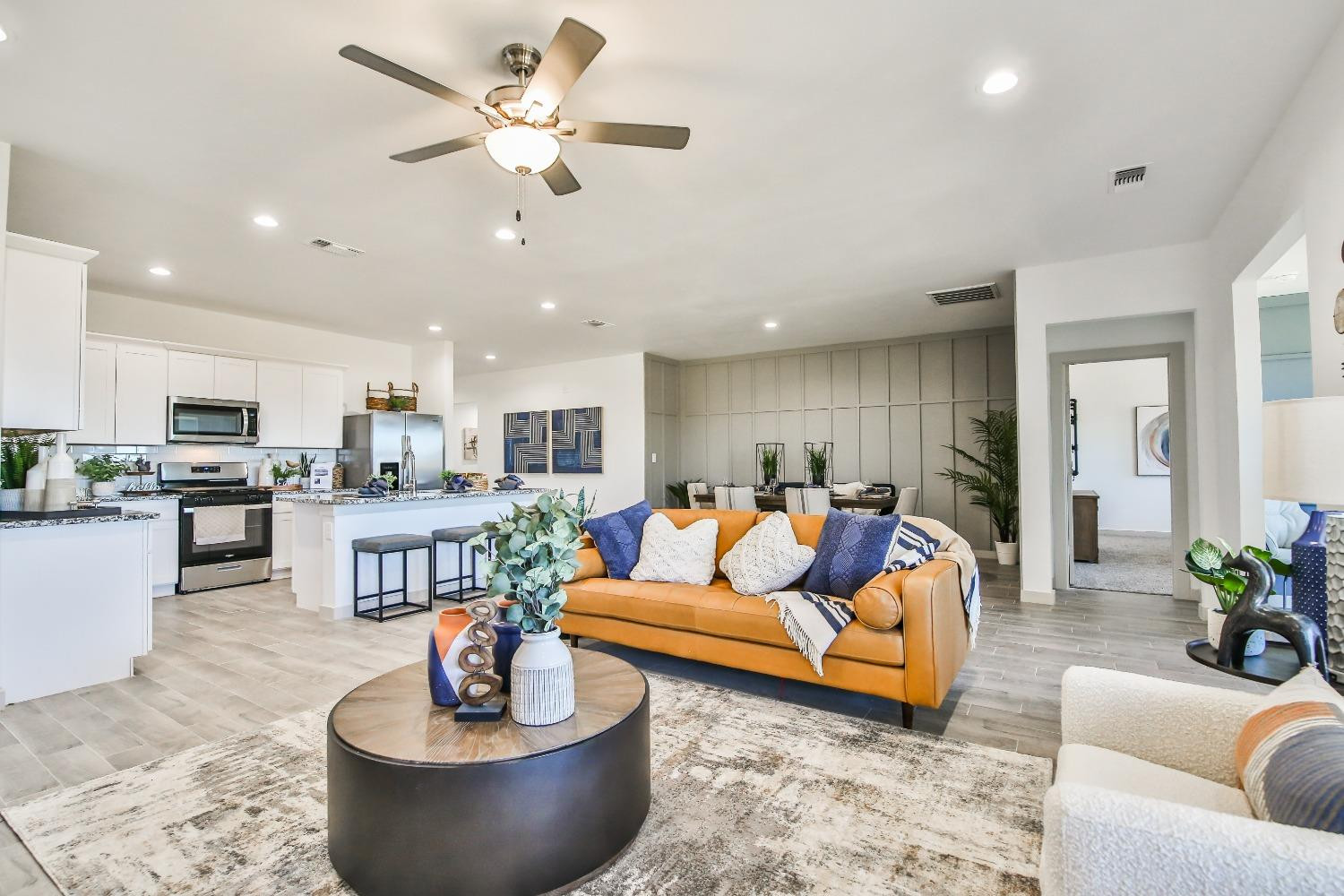 6802 55th Street Lubbock, TX 79407 - Photo 24 of 36 a living room with furniture and a view of kitchen