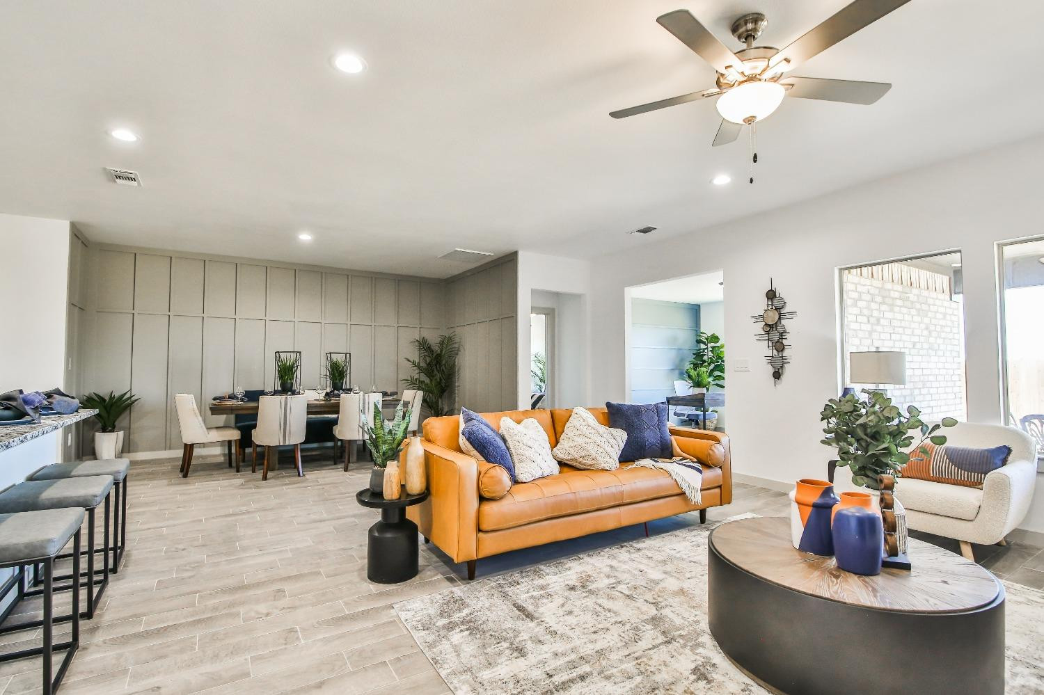 6802 55th Street Lubbock, TX 79407 - Photo 25 of 36 a living room with furniture and a large window