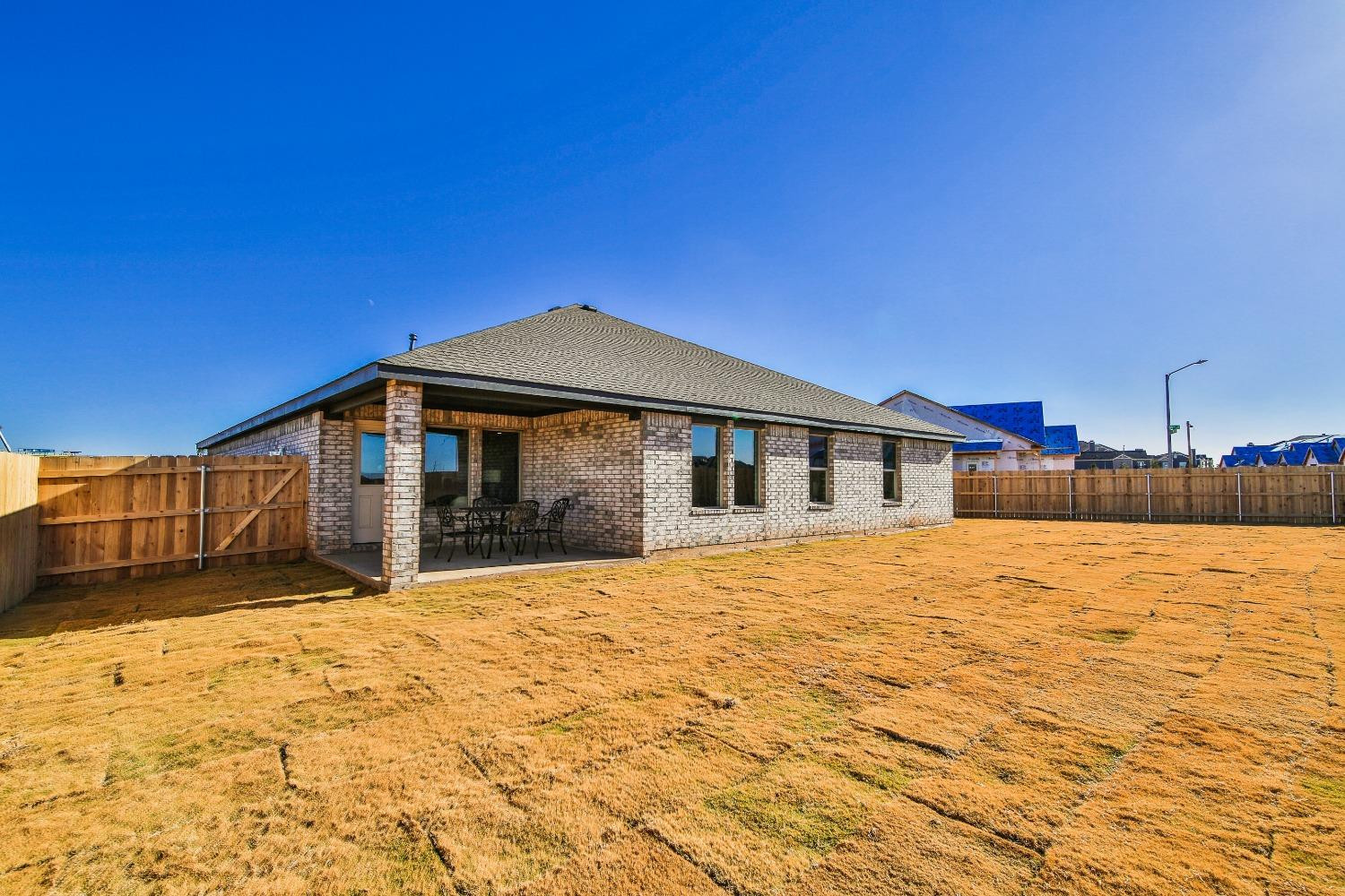6802 55th Street Lubbock, TX 79407 - Photo 36 of 36 a big house with swimming pool in front of it