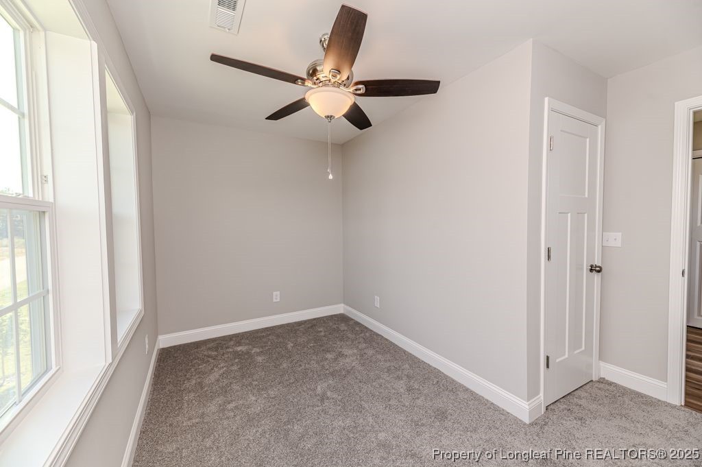 932 Allstar Avenue Cameron, NC 28326 - Photo 17 of 33 a view of an empty room with a window