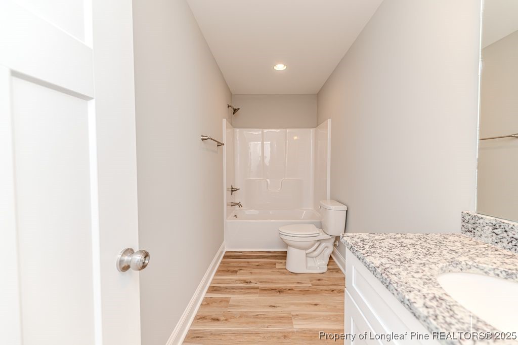 932 Allstar Avenue Cameron, NC 28326 - Photo 19 of 33 a bathroom with a sink toilet and shower