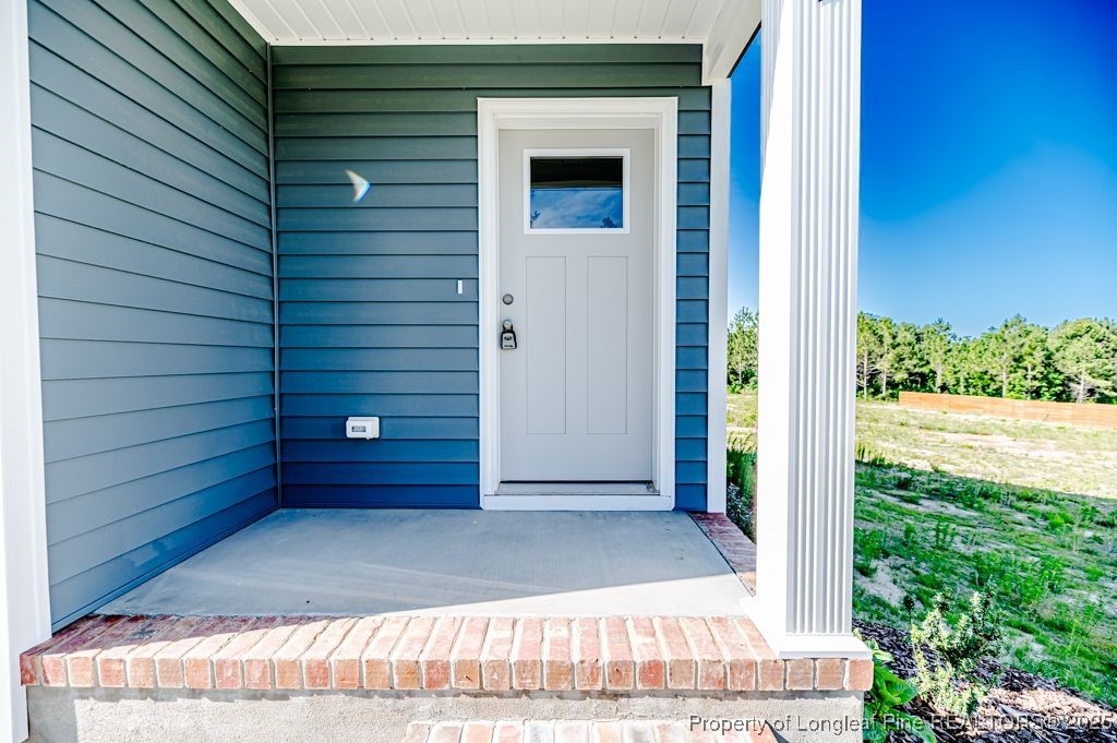 932 Allstar Avenue Cameron, NC 28326 - Photo 3 of 33 a view of front door of house