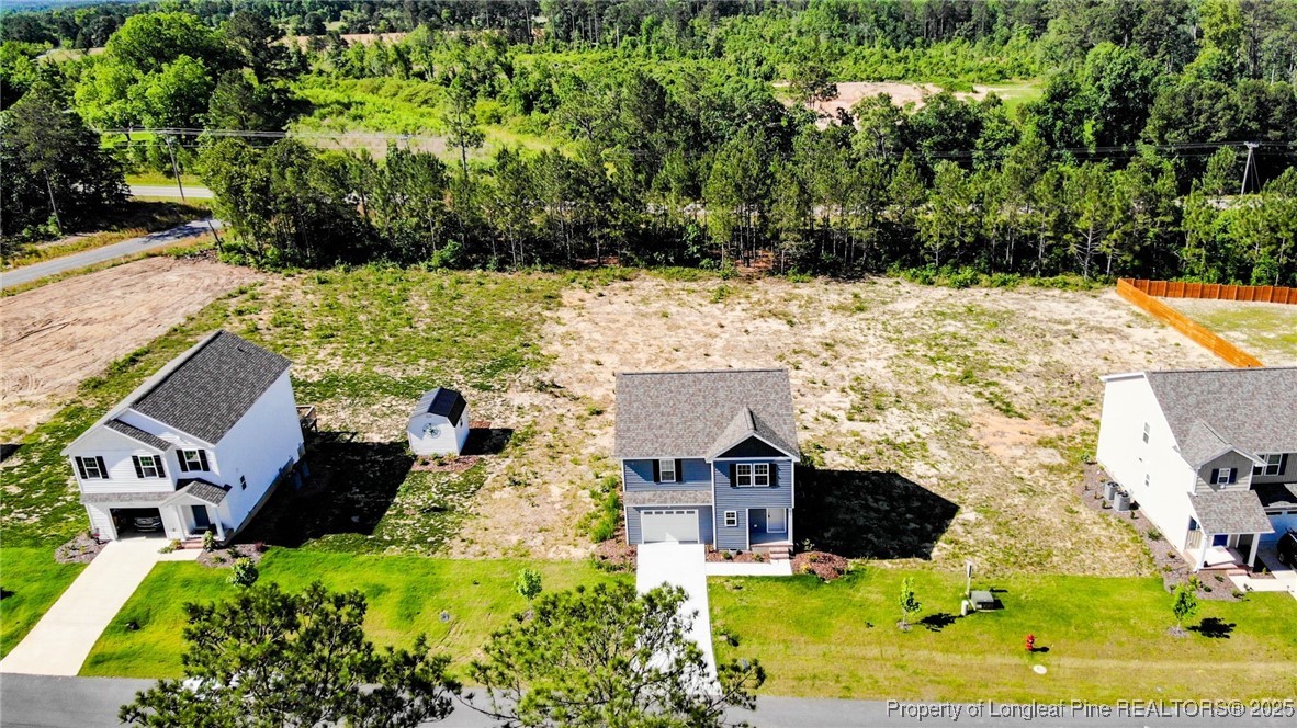 932 Allstar Avenue Cameron, NC 28326 - Photo 33 of 33 aerial view of a house with a yard and large trees