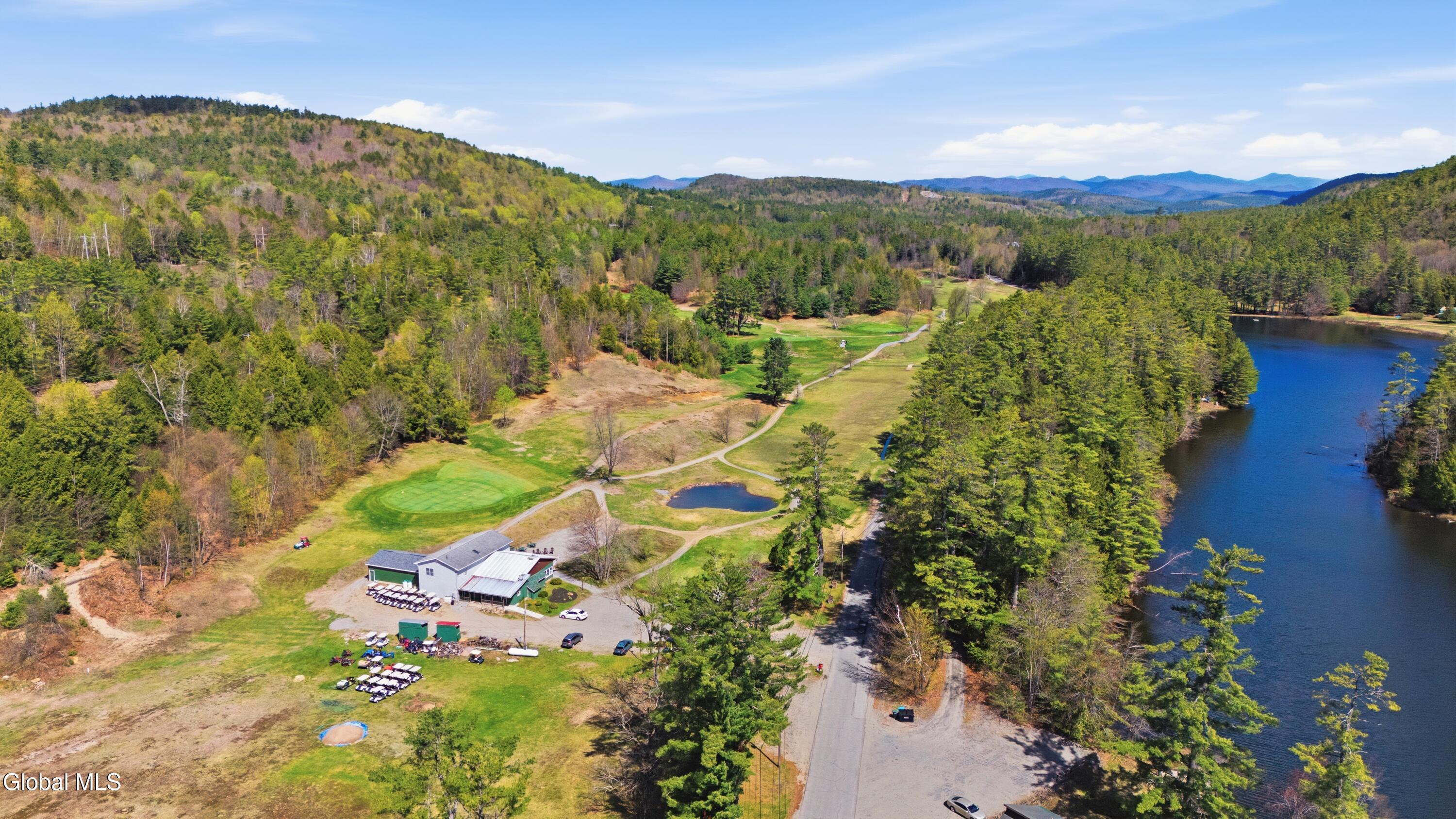 203 Tripp Lake Road Warrensburg, NY 12817 - Photo 1 of 41 DJI_20260507105404_0029_D