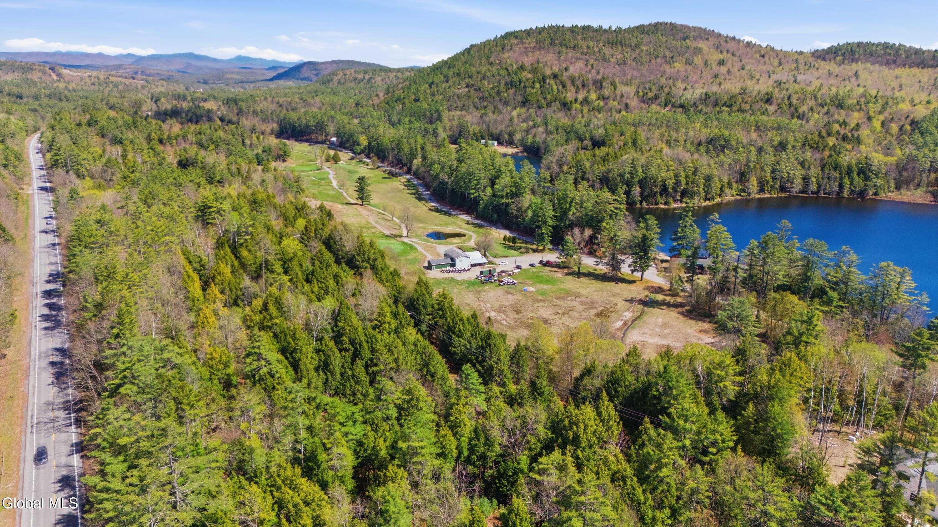 203 Tripp Lake Road Warrensburg, NY 12817 - Photo 3 of 41 DJI_20260507105540_0037_D