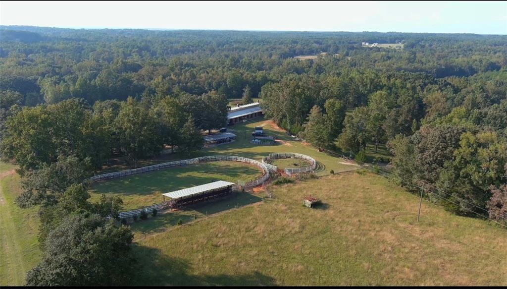 2011 Stinchcomb Road Dewy Rose, GA 30634 - Photo 15 of 20 a view of a house with a yard