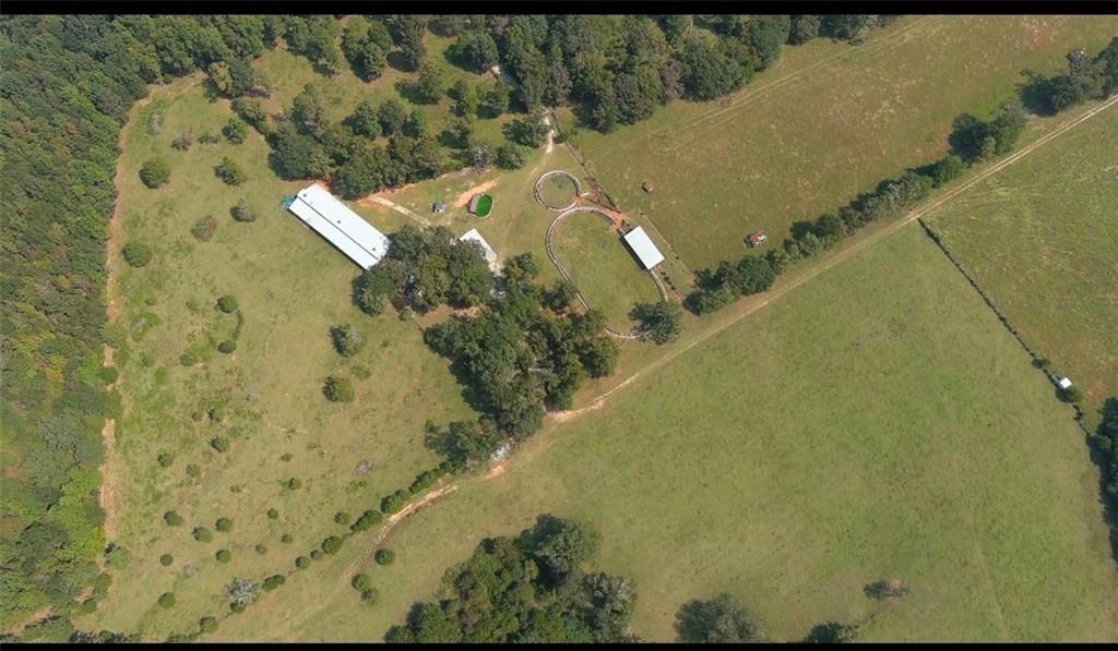 2011 Stinchcomb Road Dewy Rose, GA 30634 - Photo 3 of 20 an aerial view of a residential houses with outdoor space