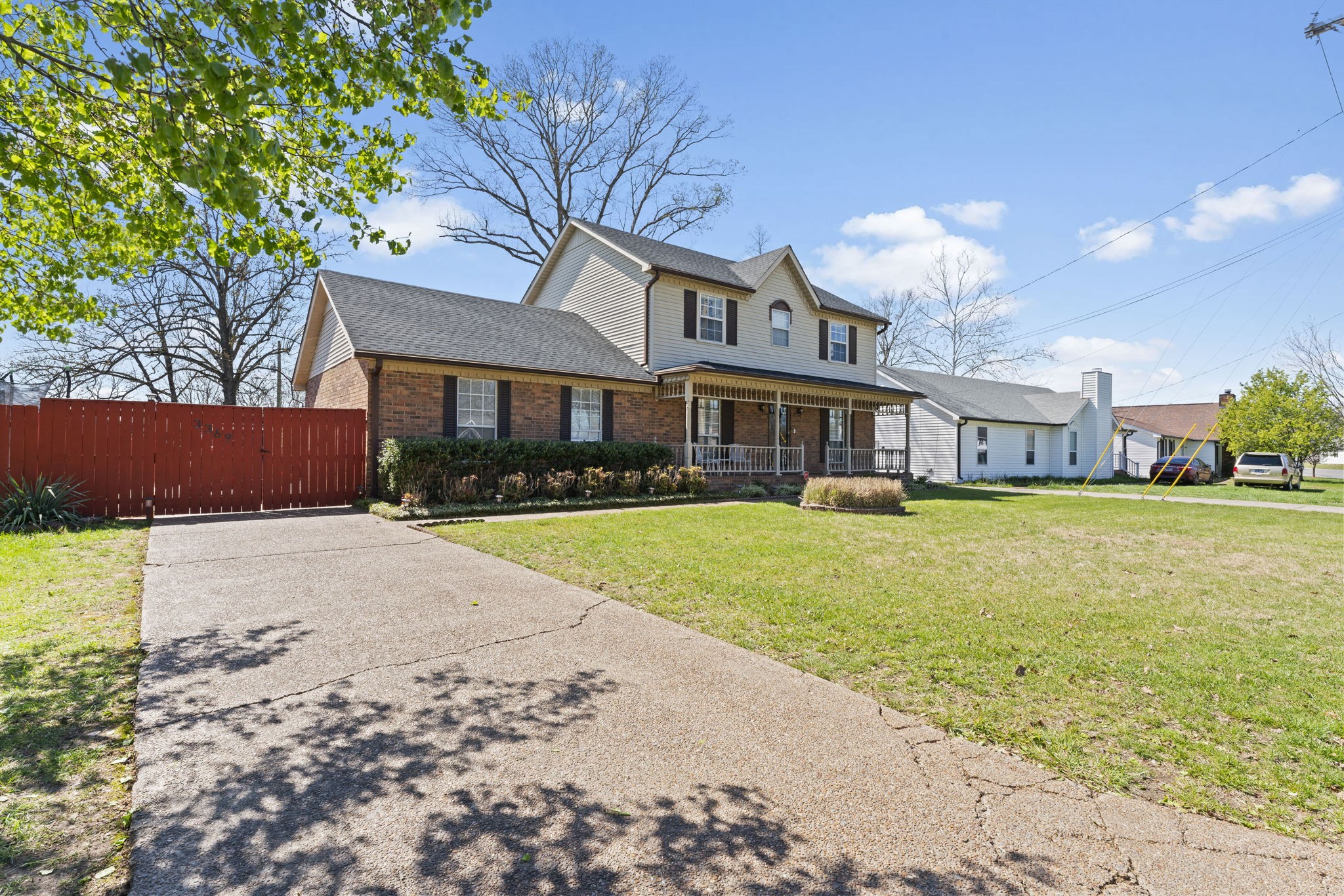 3369 Country Way Road Antioch, TN 37013 - Photo 2 of 17 a front view of a building with garden and trees