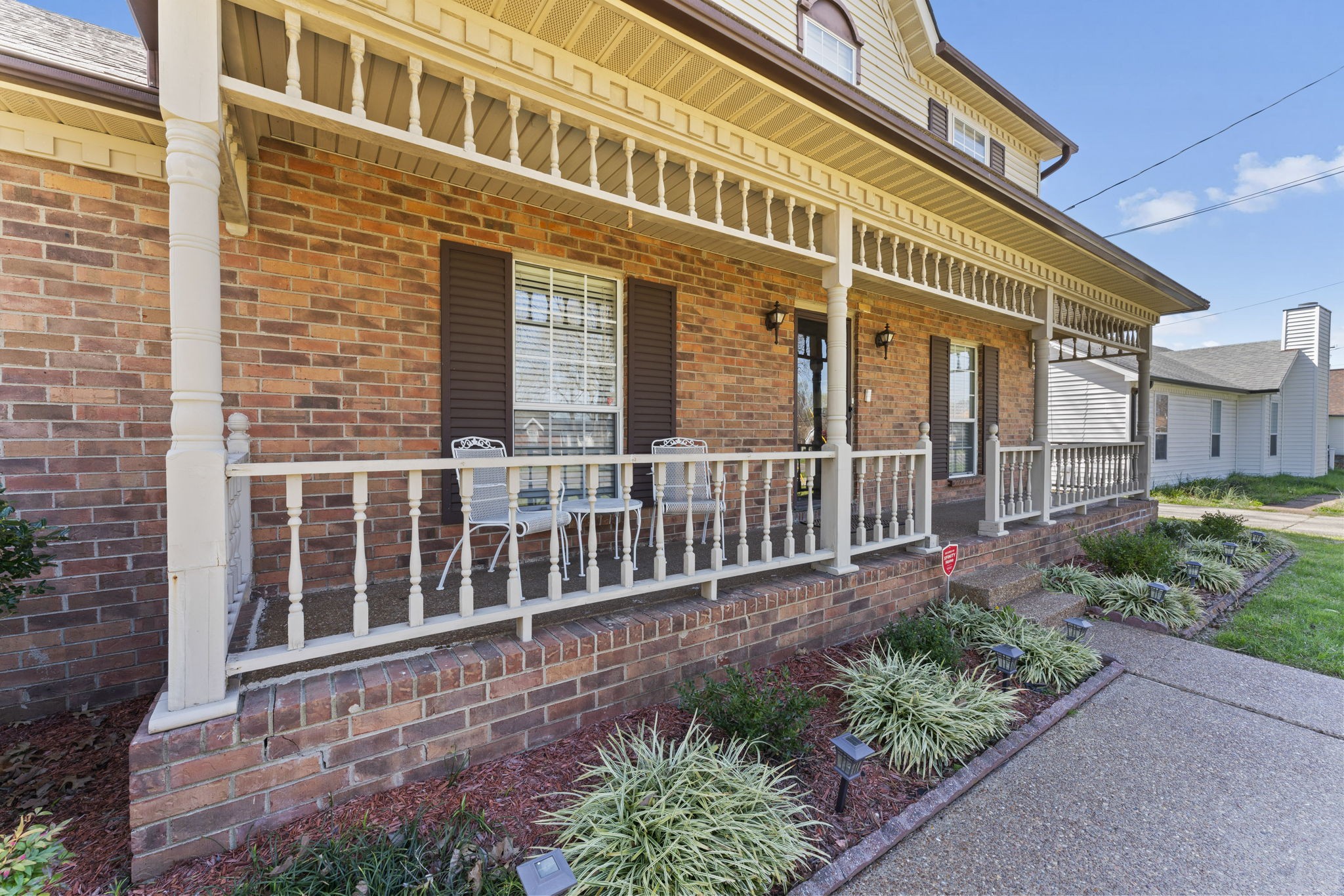 3369 Country Way Road Antioch, TN 37013 - Photo 3 of 17 a view of a brick building next to a yard