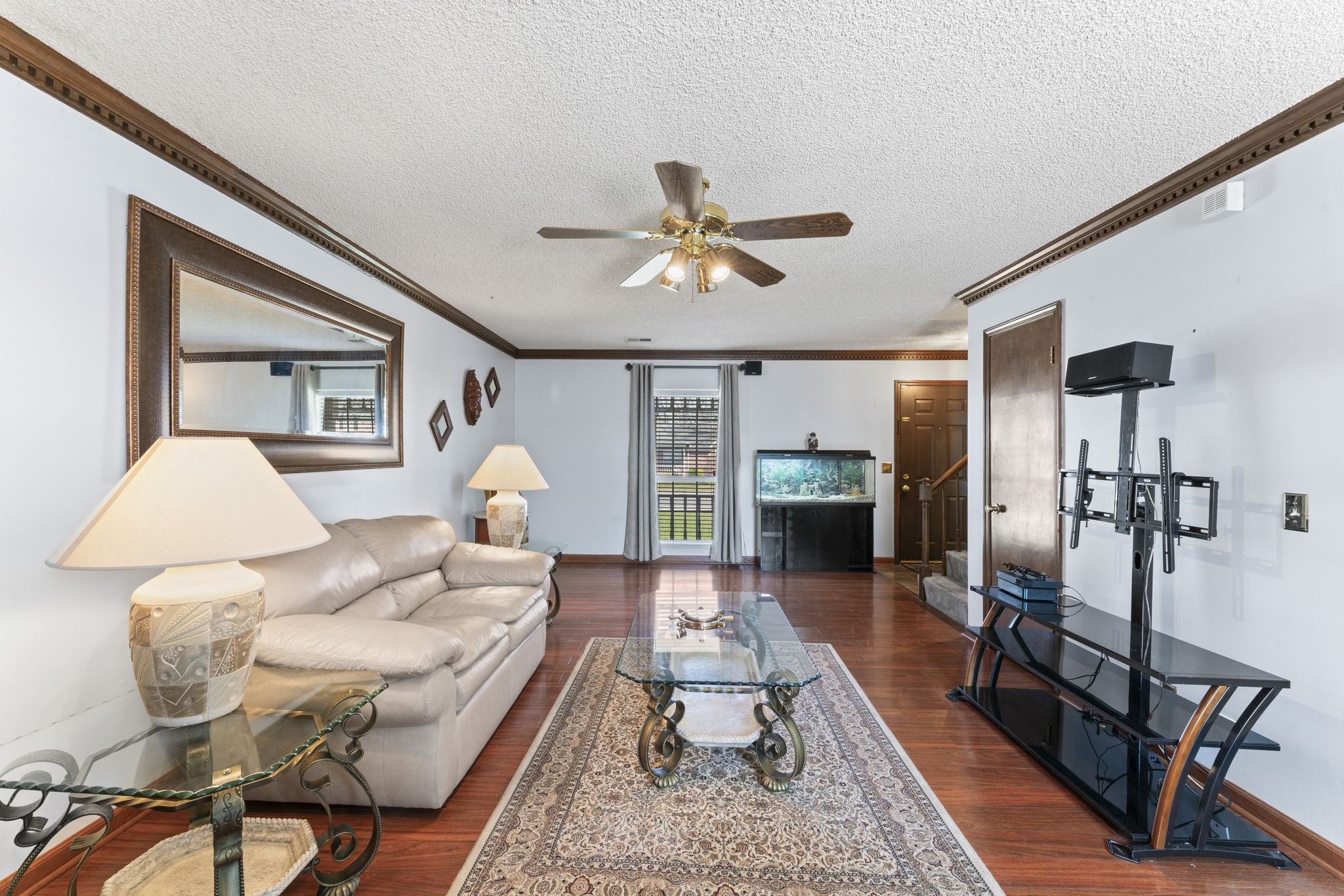 3369 Country Way Road Antioch, TN 37013 - Photo 4 of 17 a living room with furniture a chandelier and a rug