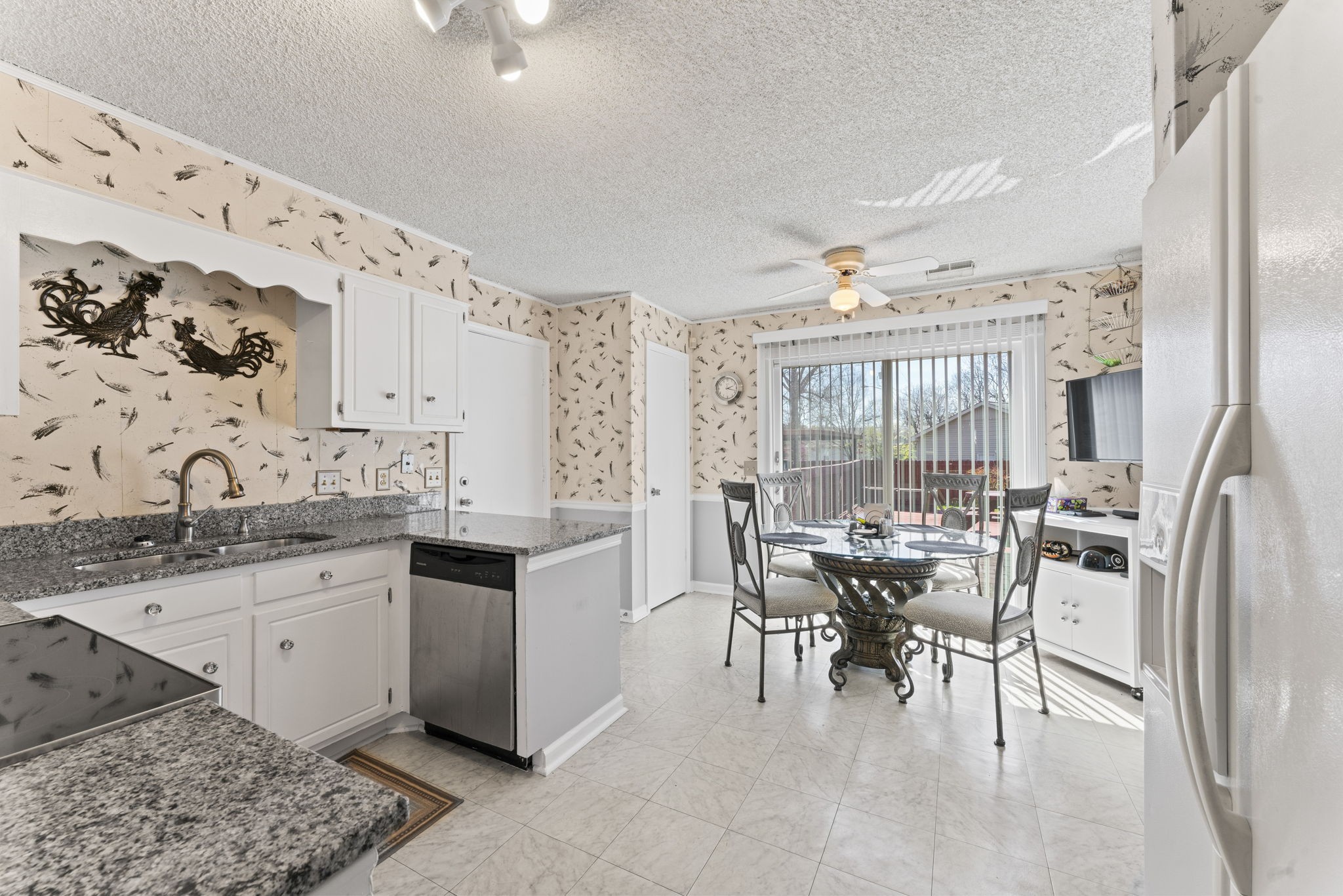 3369 Country Way Road Antioch, TN 37013 - Photo 8 of 17 a open kitchen with stainless steel appliances granite countertop a sink stove and refrigerator