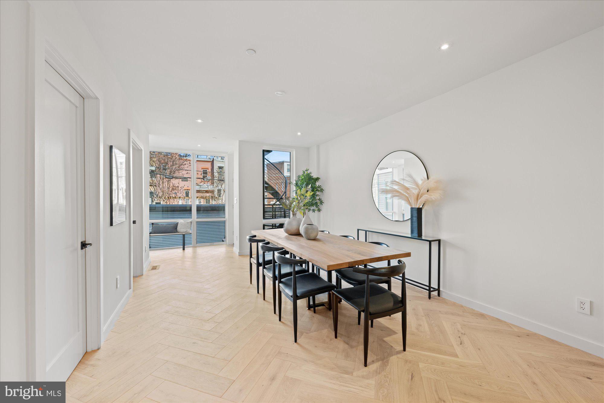 1319 R Street Northwest, Unit 2100 Washington, DC 20009 - Photo 14 of 36 a view of a dining room with furniture