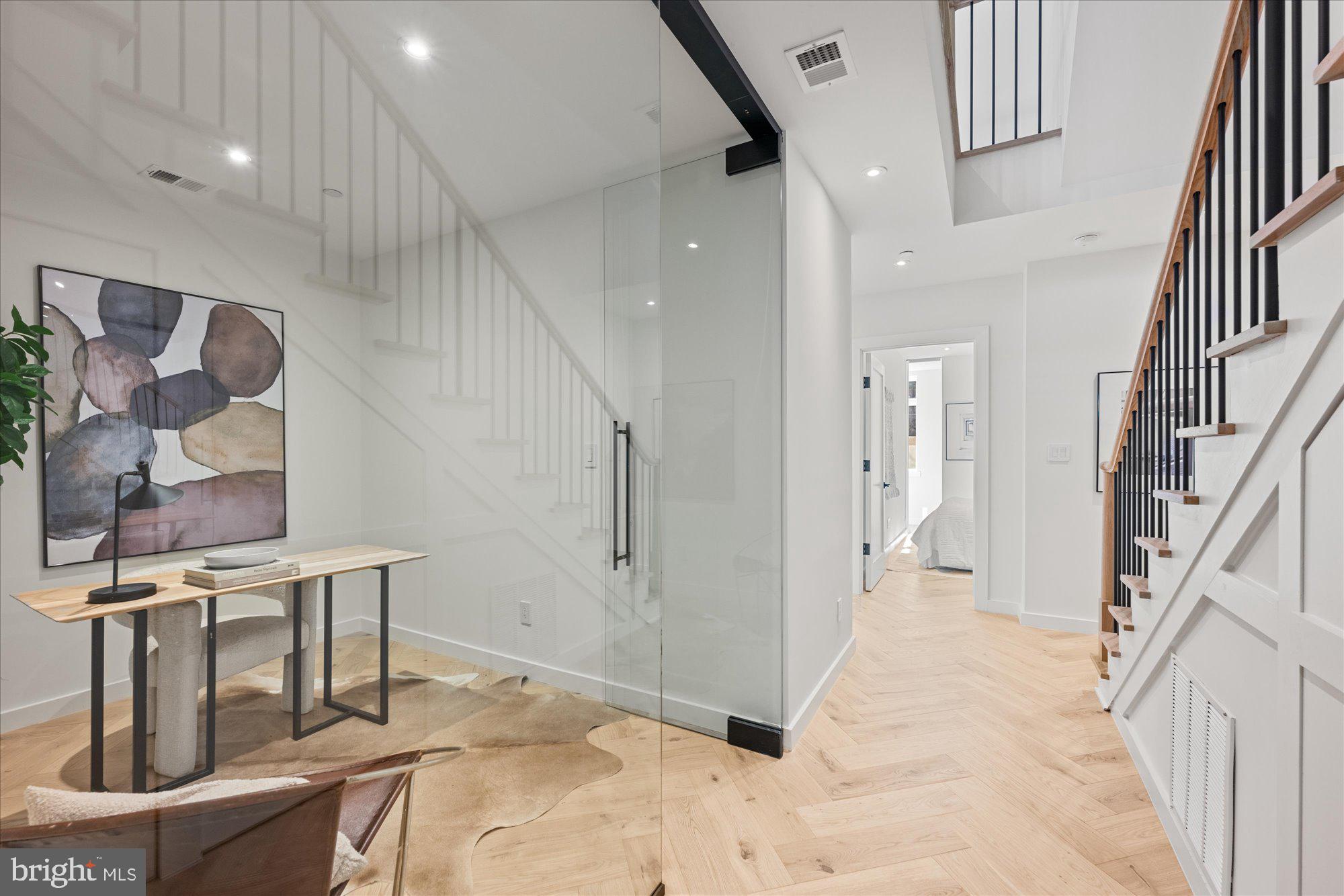 1319 R Street Northwest, Unit 2100 Washington, DC 20009 - Photo 18 of 36 a view of a hallway with seating area