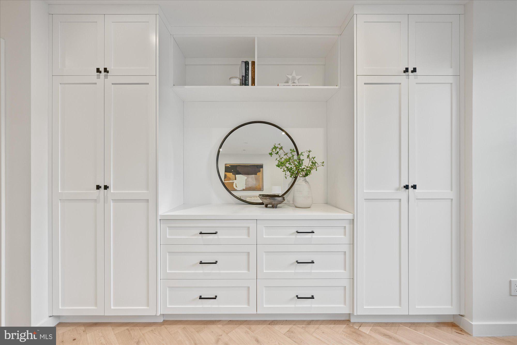 1319 R Street Northwest, Unit 2100 Washington, DC 20009 - Photo 25 of 36 a bathroom with a sink and a mirror