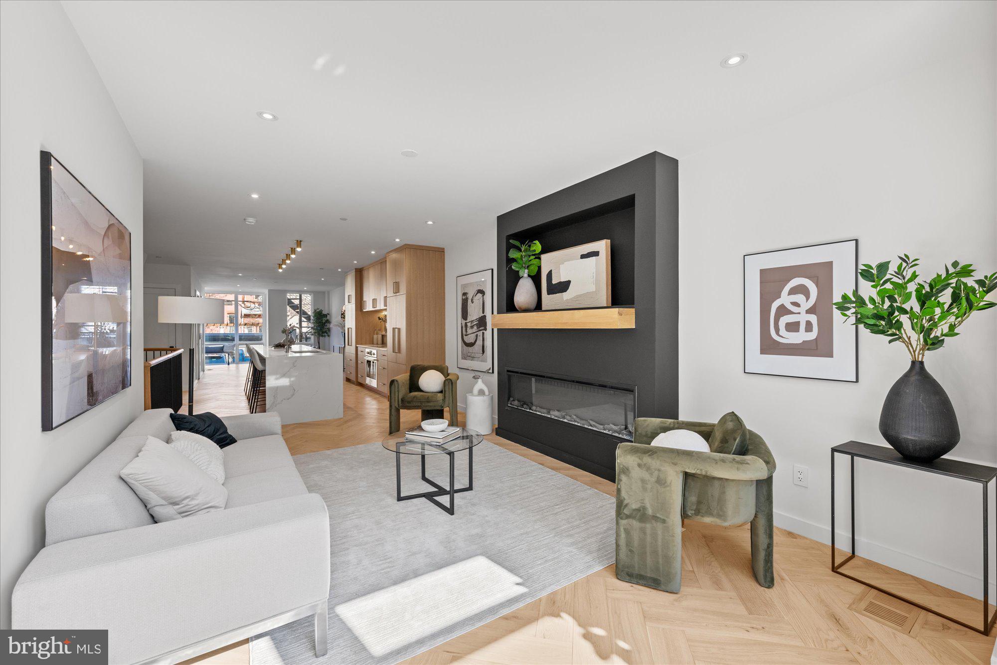 1319 R Street Northwest, Unit 2100 Washington, DC 20009 - Photo 4 of 36 a living room with furniture and painting on the wall