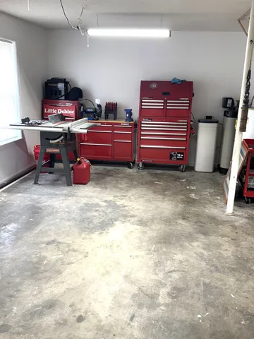 a view of a roof deck with wooden floor and seating space