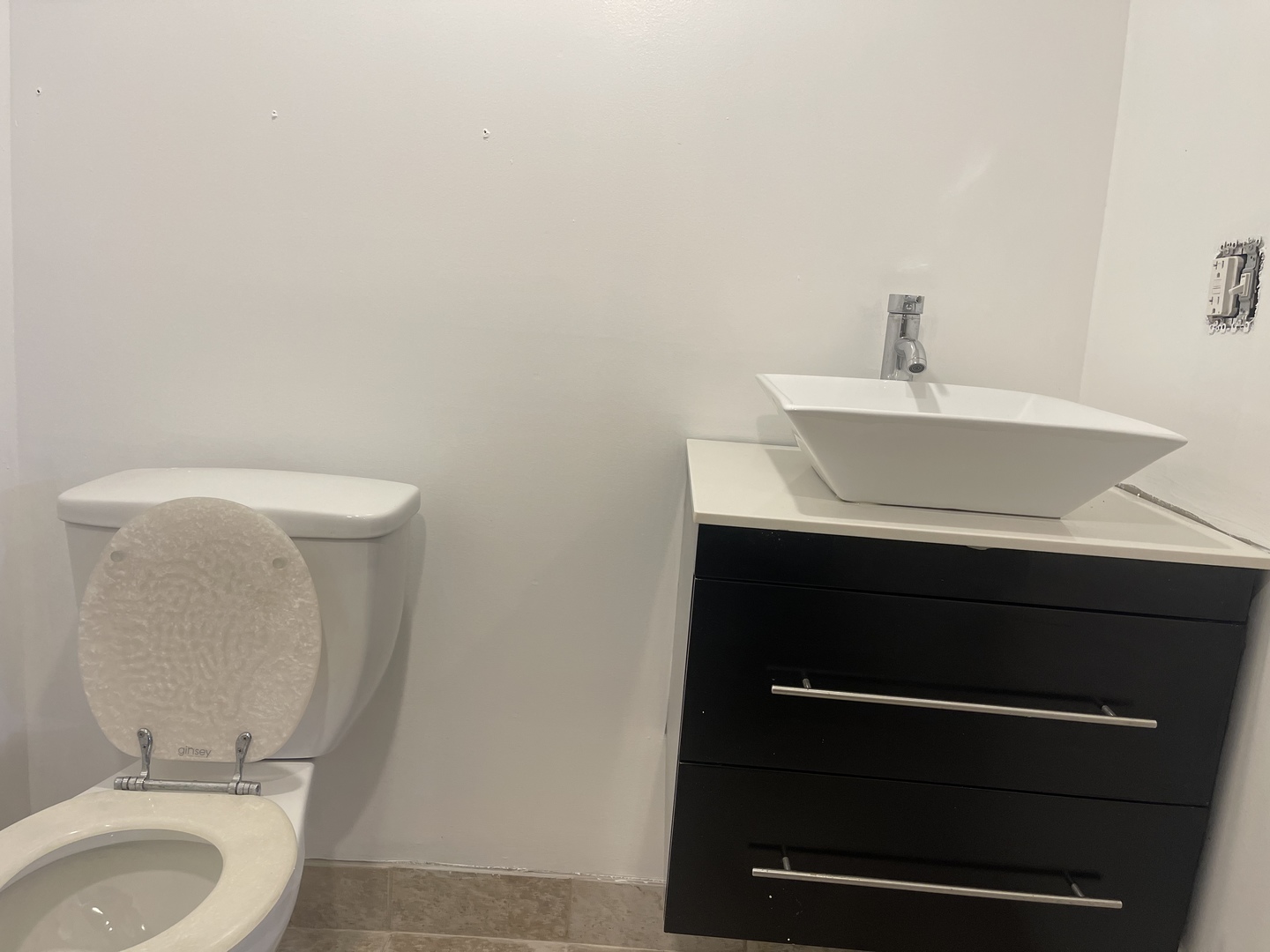 4106 North Drake Avenue Chicago, IL 60618 - Photo 13 of 18 a bathroom with a sink toilet and a mirror
