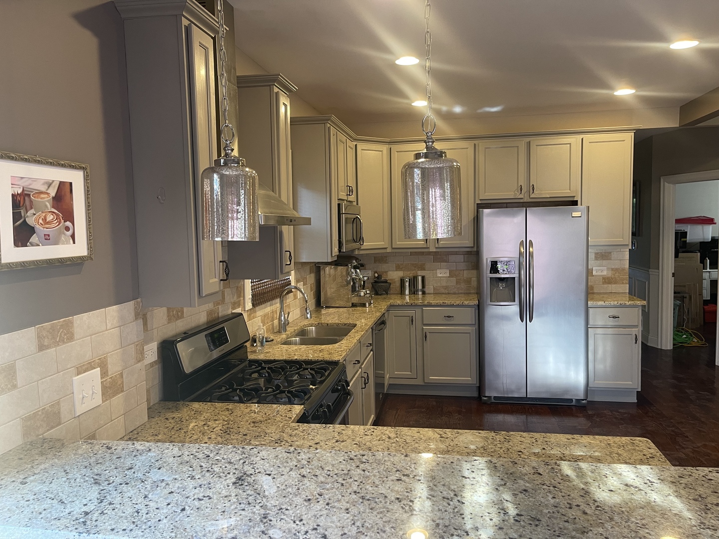 4106 North Drake Avenue Chicago, IL 60618 - Photo 5 of 18 a kitchen with refrigerator and cabinets