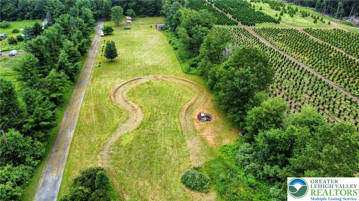223 Brink Road Saylorsburg, PA 18353 - Photo 3 of 19 an aerial view of residential houses with outdoor space and trees all around