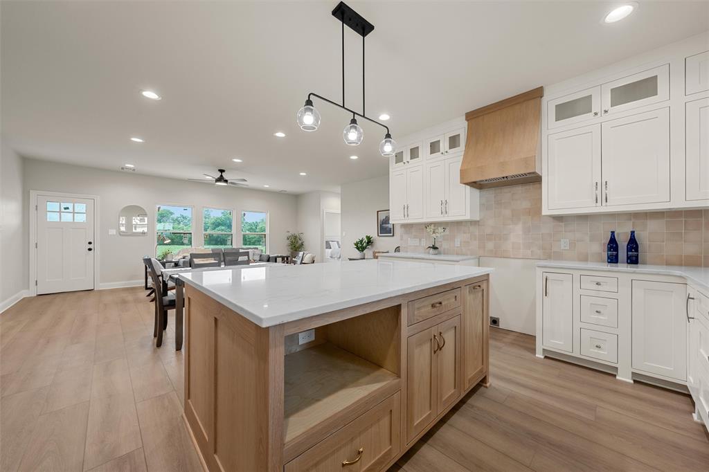 5200 Bogey Lane Waco, TX 76708 - Photo 12 of 37 a kitchen with a stove and a sink