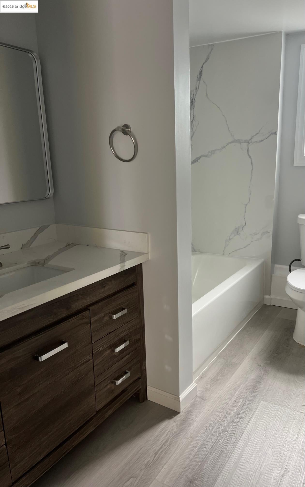 2501 Mabel Street, Unit B Berkeley, CA 94702 - Photo 4 of 7 a bathroom with a sink a toilet and shower