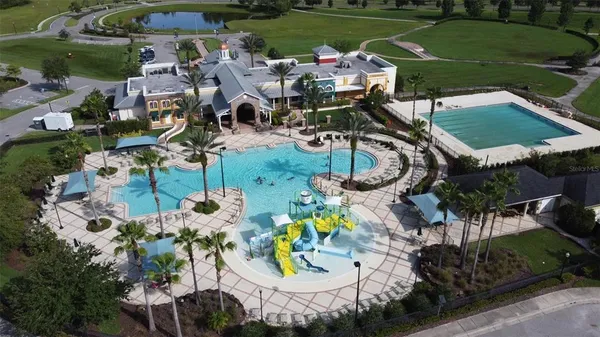 an aerial view of a house with outdoor space