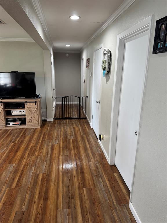 1020 Southeast 10th Street Cooper, TX 75432 - Photo 4 of 11 a view of livingroom with furniture and flat screen tv