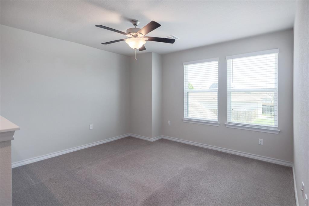 2004 Rinker Ranch Drive Austin, TX 78725 - Photo 11 of 23 an empty room with chandelier fan