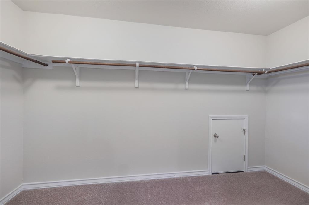2004 Rinker Ranch Drive Austin, TX 78725 - Photo 16 of 23 a view of an empty walk in closet