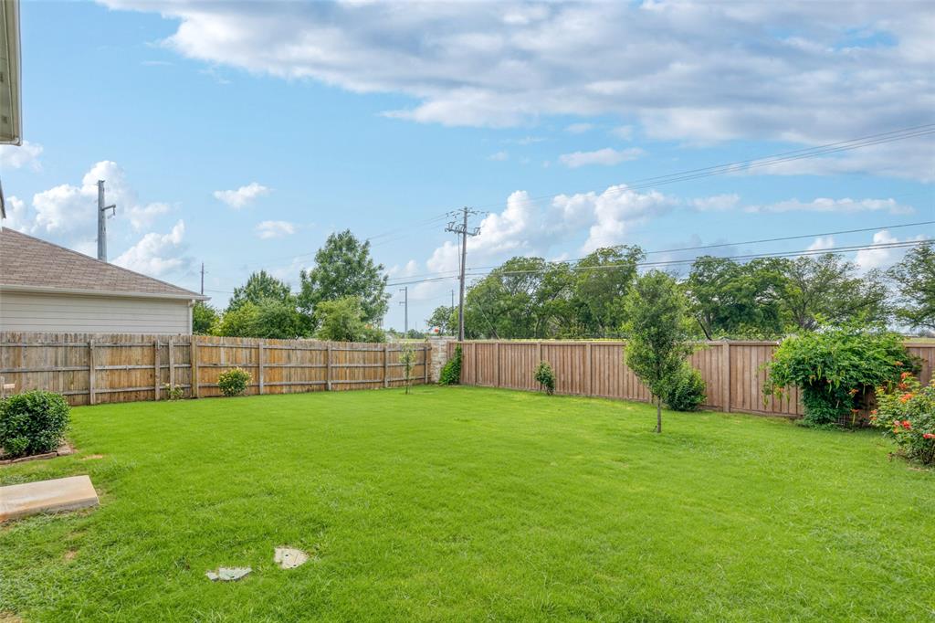 2004 Rinker Ranch Drive Austin, TX 78725 - Photo 22 of 23 a view of a backyard