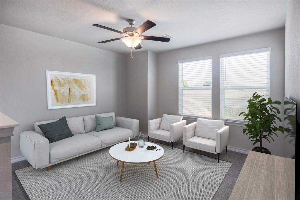 2004 Rinker Ranch Drive Austin, TX 78725 - Photo 9 of 23 a living room with furniture and a large window